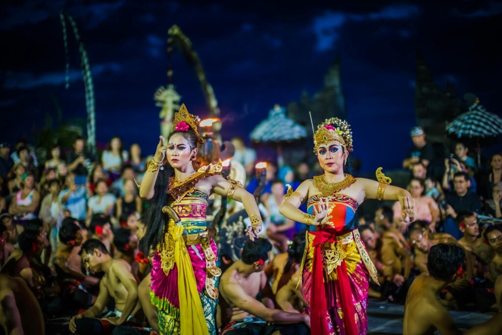 A vibrant cultural performance in Bali, showcasing traditional dancers in colorful costumes" Blog Description: Immerse yourself in the vibrant tapestry of Bali's cultural richness, where age-old traditions blend seamlessly with contemporary life. From mesmerizing dance performances to intricate temple ceremonies, Bali's cultural landscape is a testament to its enduring heritage and the resilience of its people.